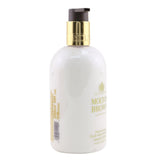 Molton Brown Mesmerising Oudh Accord & Gold Hand Lotion 300ml/10oz