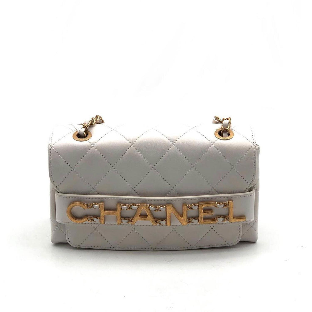 Chanel Logo Enchained Flap Bag Black Calfskin Gold Hardware  Coco Approved  Studio
